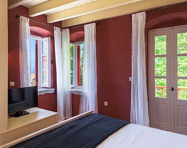 Bedroom-3a-380x300 Platanos Cottage, Traditional House in Symi - Professional Photography Harry Zampetoulas 