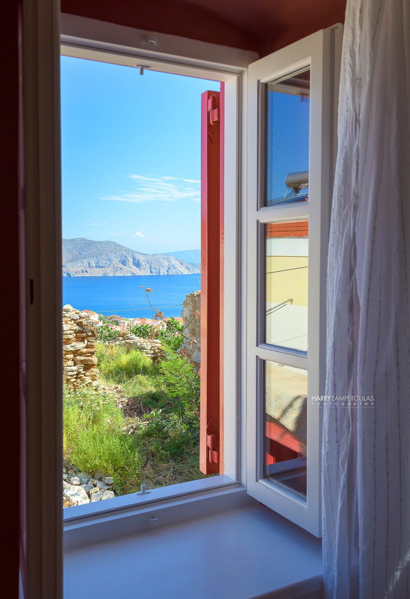 View-1-823x1200 Platanos Cottage, Traditional House in Symi - Photography Harry Zampetoulas 
